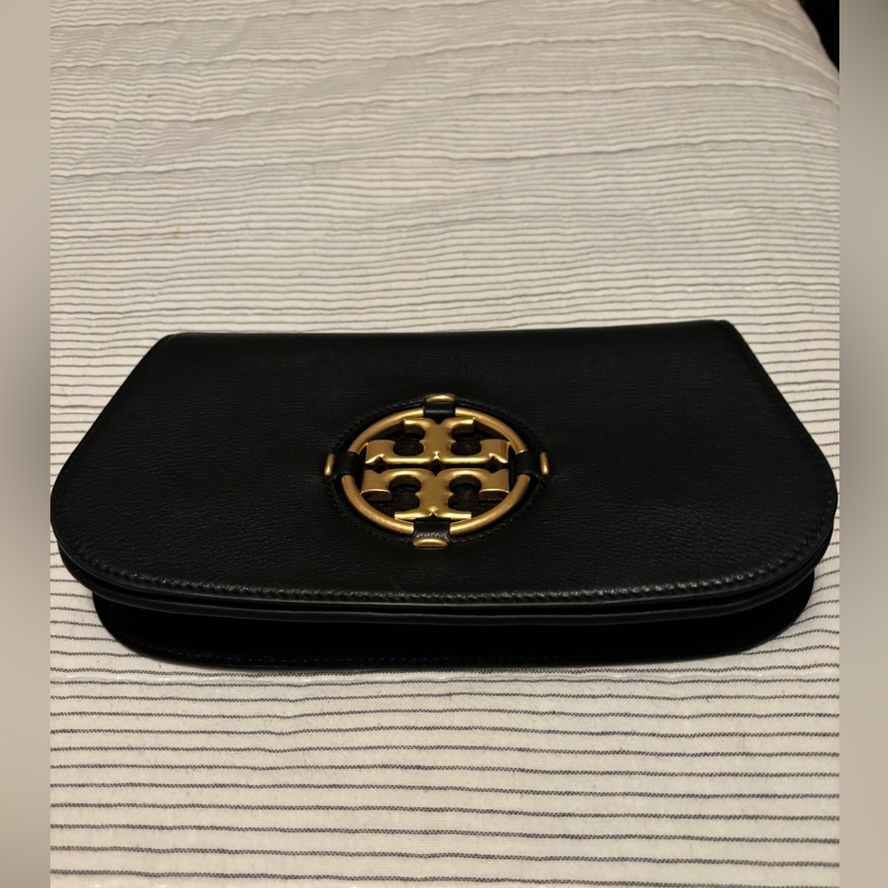 Tory Burch Elegant Black Clutch with Gold Emblem